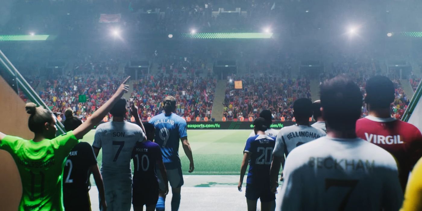 A group of soccer players take the field at night, facing the glow of the lights on the pitch and a teeming, cheering crowd.