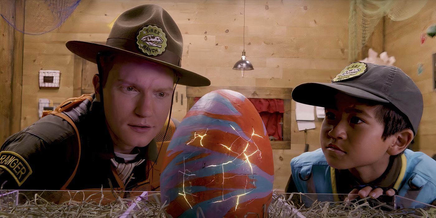 Park Ranger Orson (Michael Deni) and Park Ranger Asher (Jett Automo) looking at a dinosaur egg in Blippi.