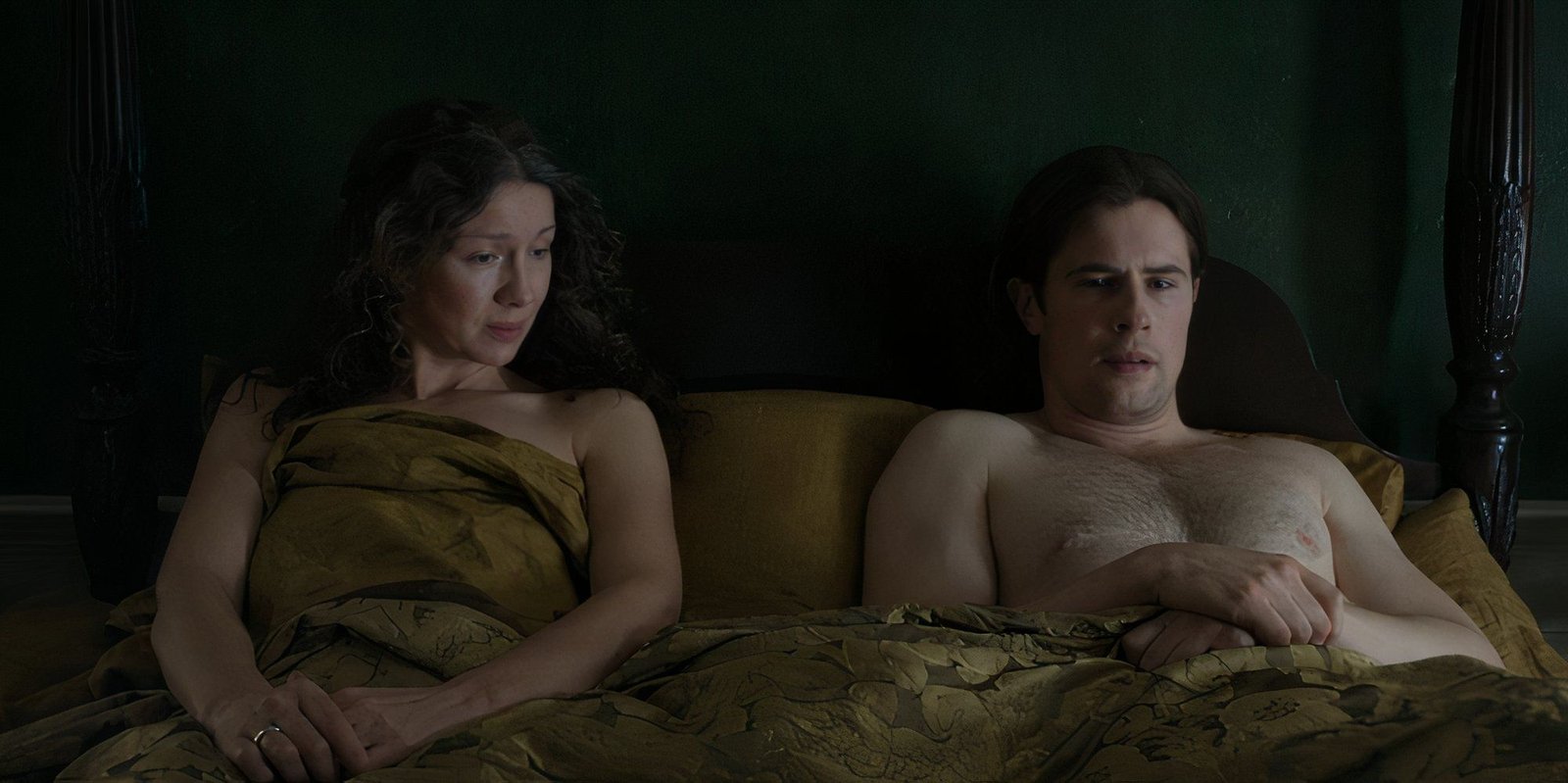 Claire and Lord John in bed together in Outlander